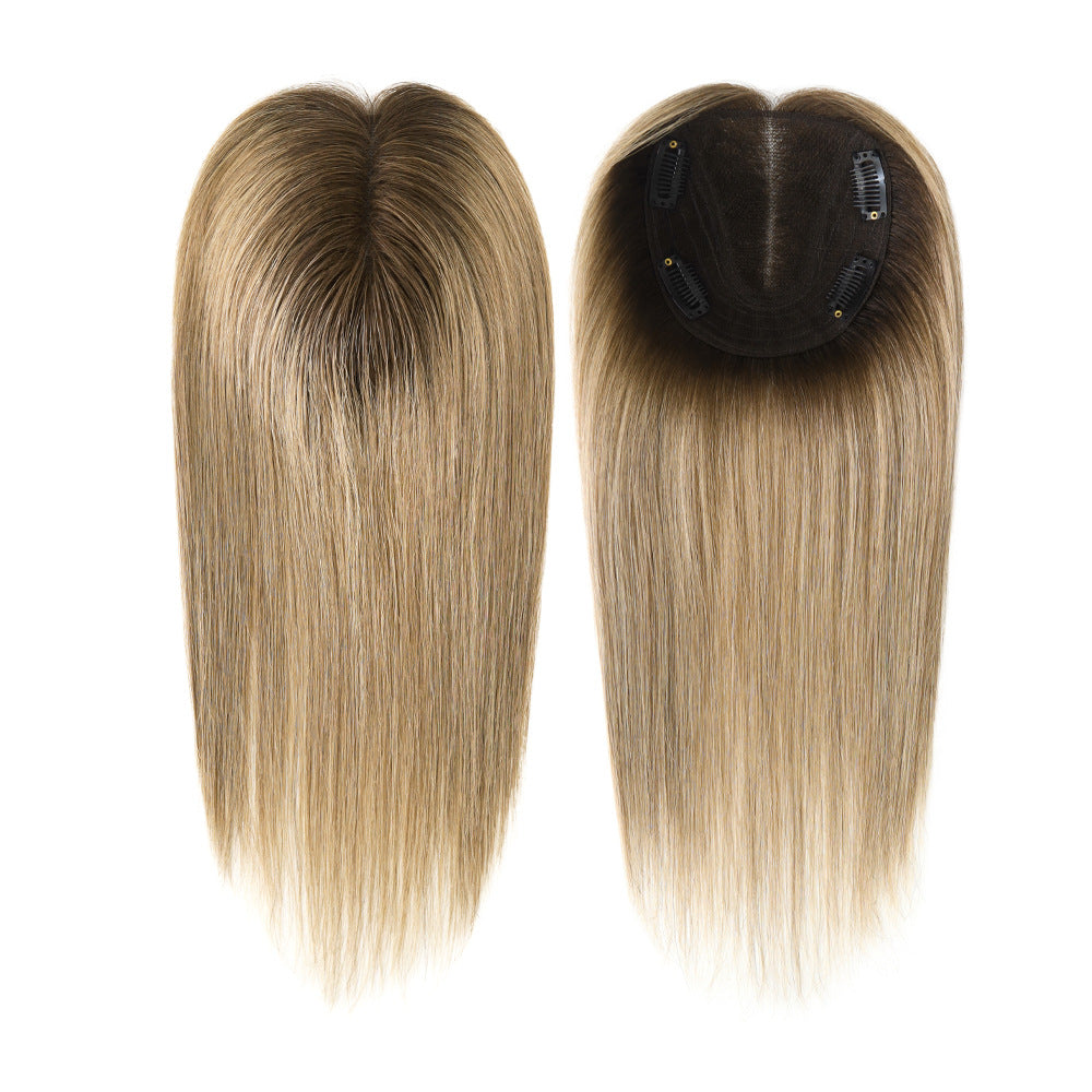 dark blonde hair topper with brown roots, 4 black clips on lace base