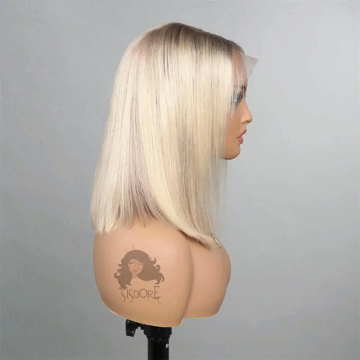side view of a short platinum blonde ombre bob wig with dark roots straight human hair